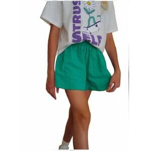 NEW HUNDRED PIECES flowy eyelet shorts in green